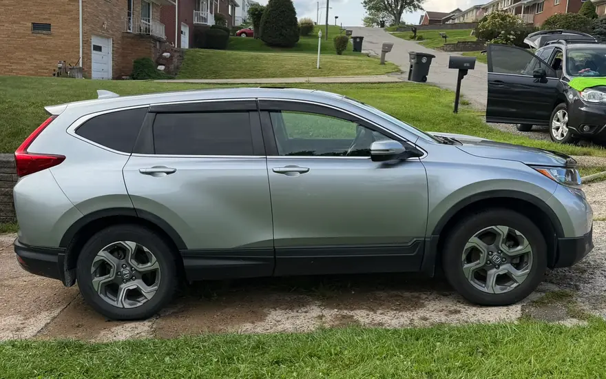The car washed and dried on the driveway