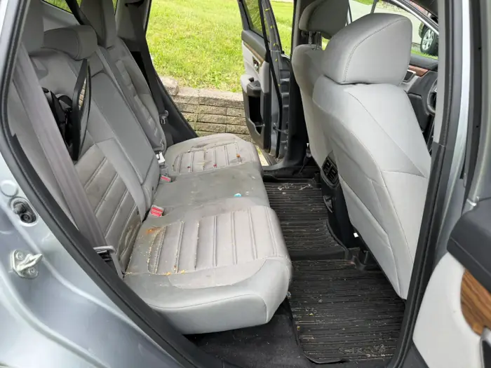 Rear bench and footwells before the detail